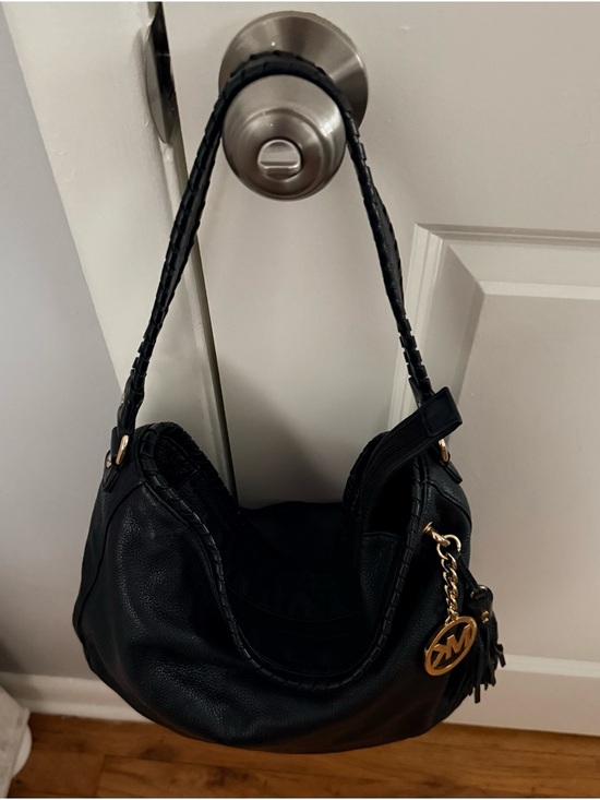 Michael Kors Handbags - Michael Kors Black Pebbled Leather Hobo with Gold Logo Charm and Tassel EUC